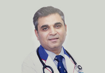 Dr. TUSHAR MITTAL