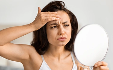 Reasons for forehead pimples