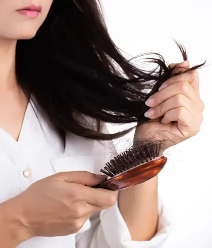 Non-surgical hair replacement vs. hair transplantation