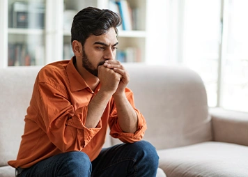 Having low self-confidence or withdrawing from social situations