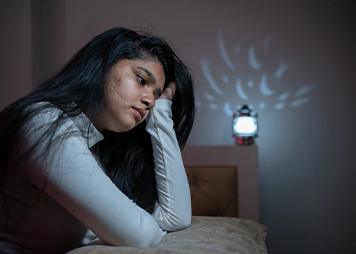 Having low self-confidence or withdrawing from social situations