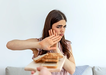 Nausea, vomiting, diarrhoea, or cramps