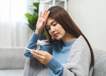 Having low self-confidence or withdrawing from social situations