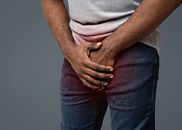 Pain or swelling in testicular region