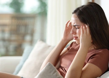 Having low self-confidence or withdrawing from social situations