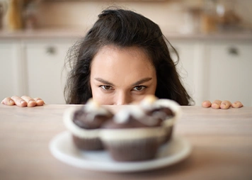 Having low self-confidence or withdrawing from social situations