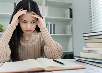 Having low self-confidence or withdrawing from social situations